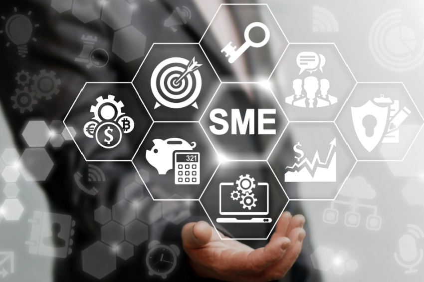 A businessman holding virtual SME venture loan options.